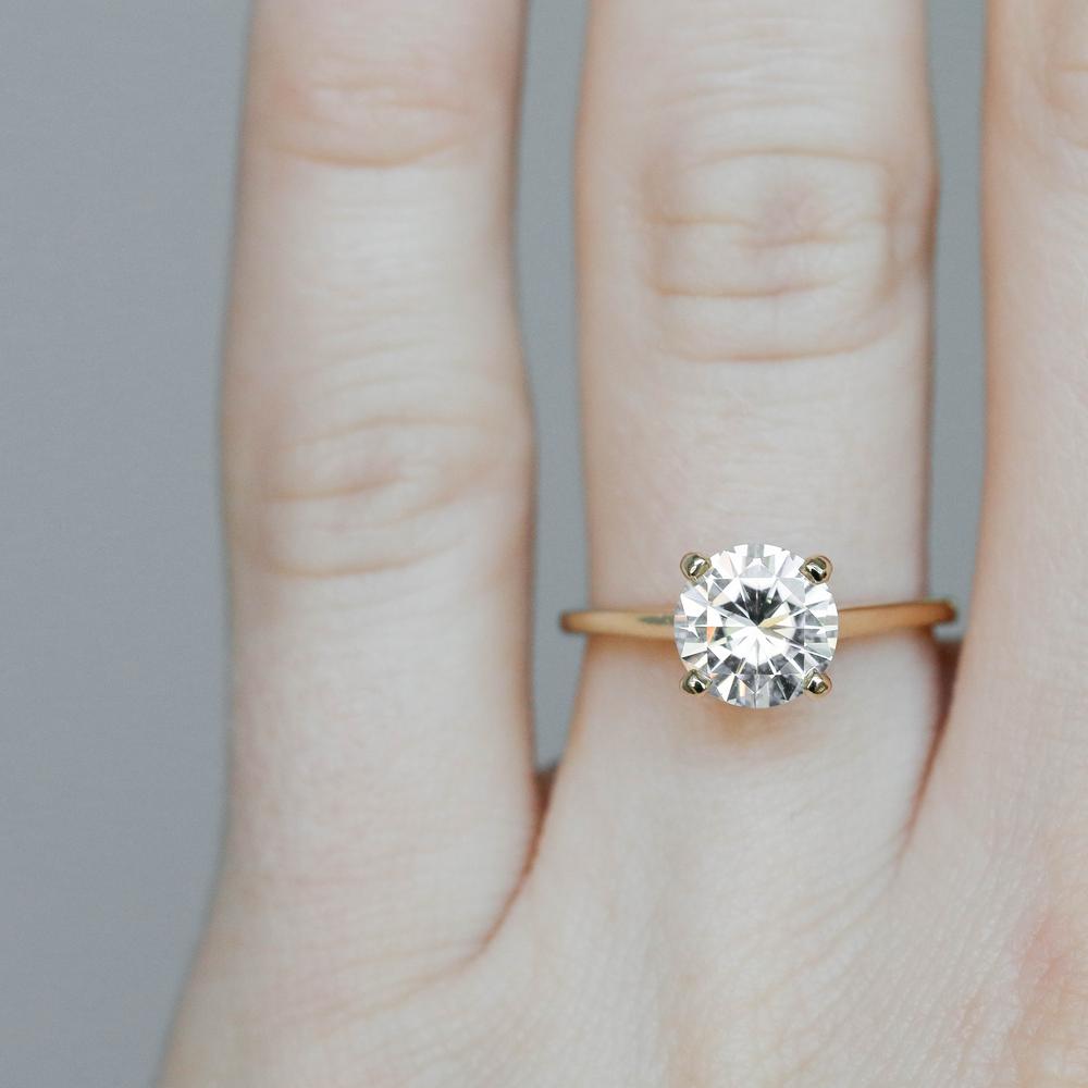 Round Cut Moissanite 4 Prong Petite Comfort Fit Ring with 1 to 3 carats in 9k/10k/14k/18K White Gold, Yellow Gold or Rose Gold