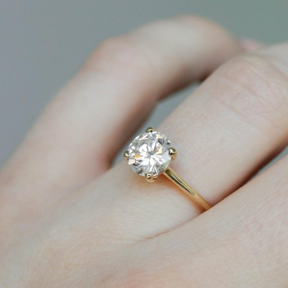 Round Cut Moissanite 4 Prong Petite Comfort Fit Ring with 1 to 3 carats in 9k/10k/14k/18K White Gold, Yellow Gold or Rose Gold